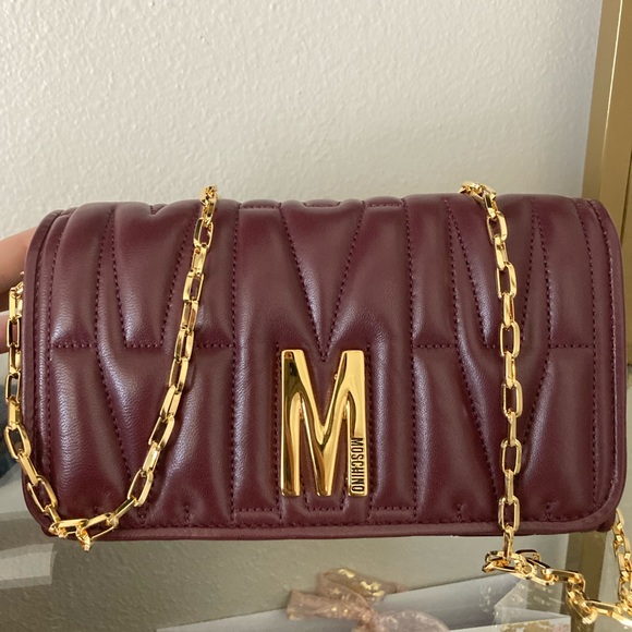 Moschino Handbags - SOLD Moschino Burgundy Crossbody Bag with Gold Chain
